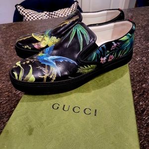 Gucci slip on sneakers.